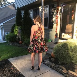 Black and flower embroidered Ellie Wilde dress
